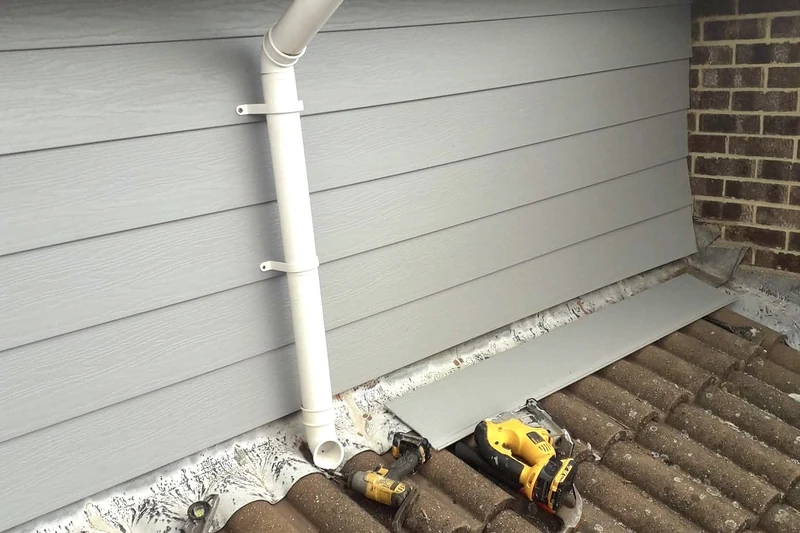 Rainwater hopper and downpipe replaced on exposed coastal property — Mitchell Hunter Handyman, Herne Bay | mitchhandyman.co.uk