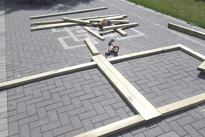 Timber deck frame being built on block paved garden — Mitchell Hunter Handyman, Whitstable | mitchhandyman.co.uk