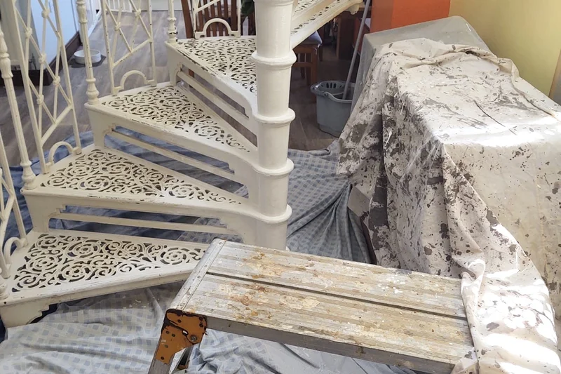 Handyman Reculver — cast iron spiral staircase being repainted white, Mitchell Hunter Handyman | mitchhandyman.co.uk