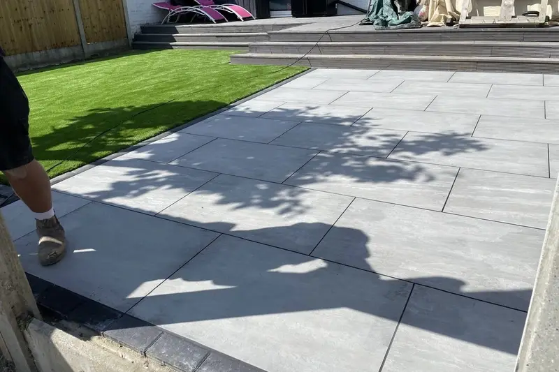 Patio pressure washing Herne Bay — slabs cleaned back to bare stone joints cleared surface ready to seal | mitchhandyman.co.uk