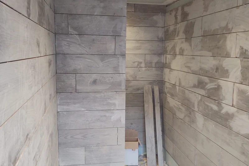 Bathroom tiling in progress, walls being tiled — Mitchell Hunter Handyman, Herne Bay | mitchhandyman.co.uk